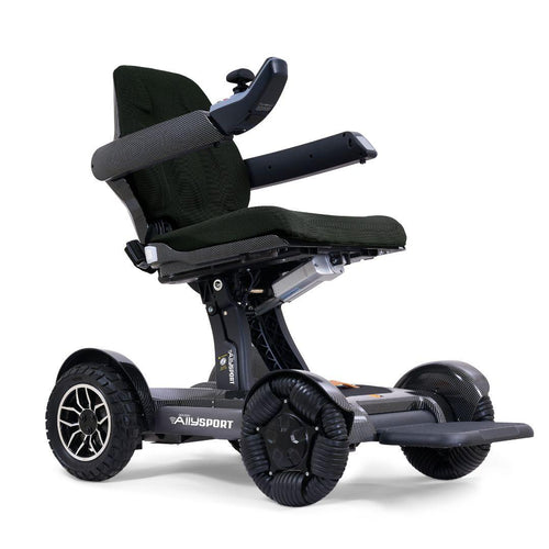 Golden Ally Sport GP305 power wheelchair in Carbon Fiber, three-quarter front view with footplate down