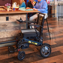 Golden Stride GP301 parked at a restaurant high-top table