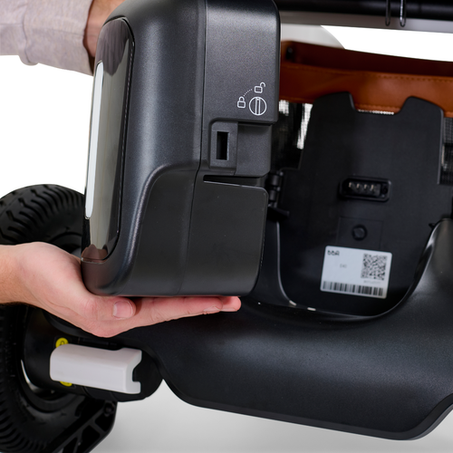 Golden Ally airline-approved 12Ah lithium-ion battery being removed from the chair