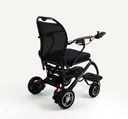 Monarch MM60 Carbon power wheelchair, three-quarter rear view showing the mesh backrest