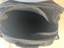 Golden hard-sided travel case MBA-BAG-GSBP — interior with mesh partition