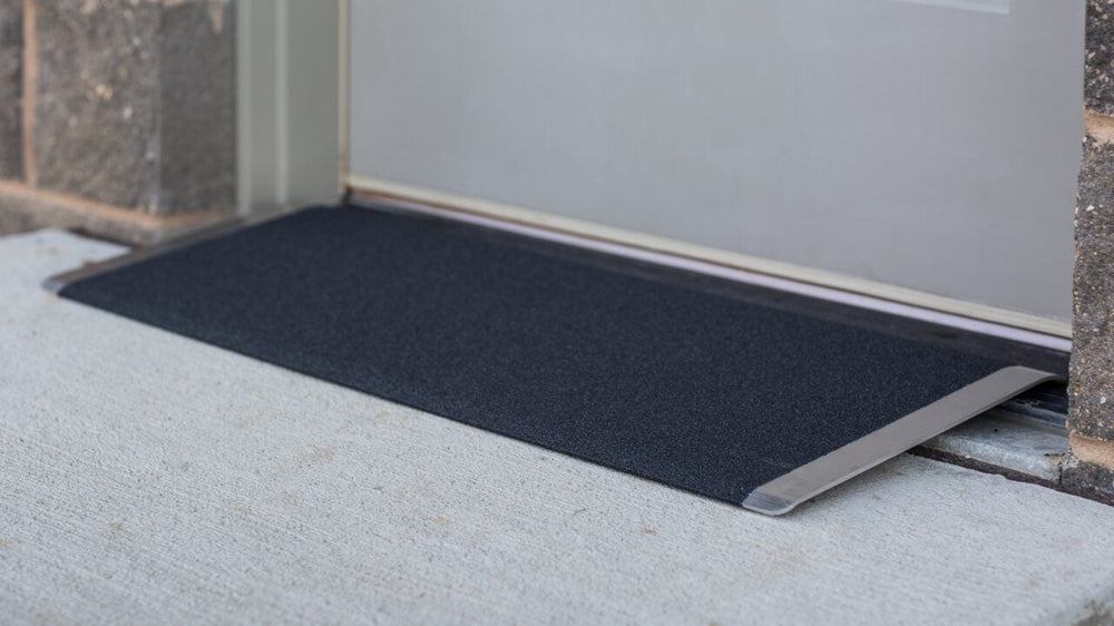 EZ-ACCESS TRANSITIONS Angled Entry Plate on a doorway threshold