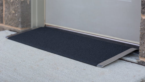 EZ-ACCESS TRANSITIONS Angled Entry Plate on a doorway threshold