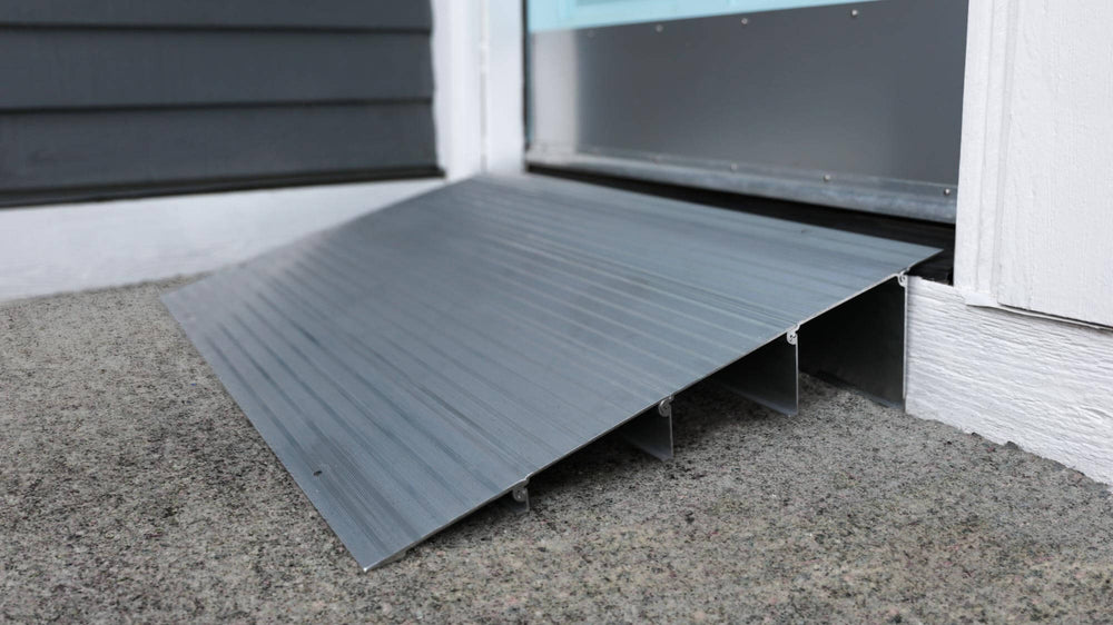 EZ-ACCESS TRANSITIONS Modular Entry Ramp at a doorway