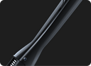 Close-up of the carbon fibre weave on a WHILL Model C Lite frame tube.