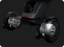 Cutaway view of the WHILL Model C Lite rear drive showing a motor mounted at each rear wheel.